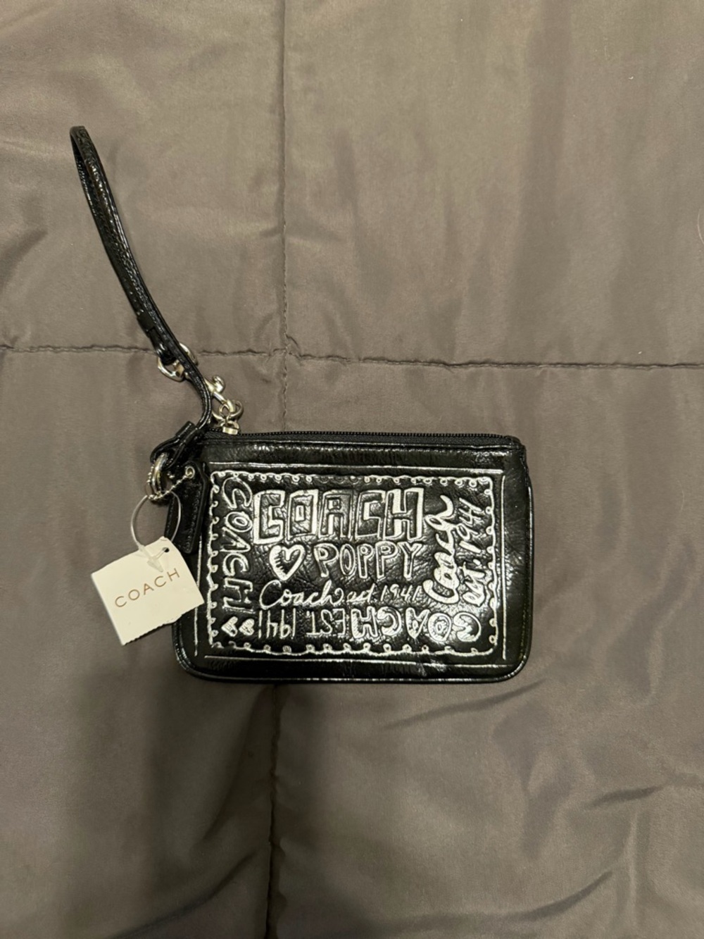 COACH Poppy Graffiti Embossed Patent Wristlet - Black